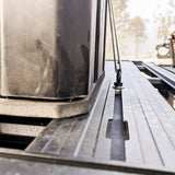 eva foam holder with tie down kit for front runner wolf pack - roof rack