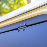 close up of the hinge on a troopy gullwing window installed